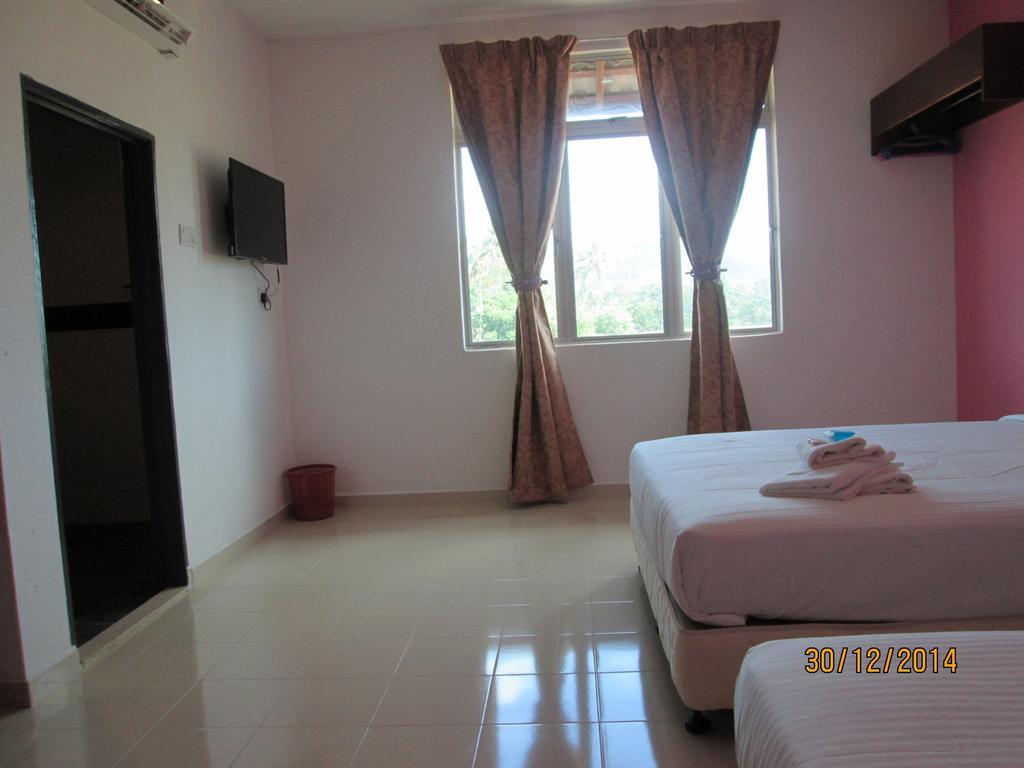 Oyo 275 Senyum Inn Pantai Cenang  Quarto foto